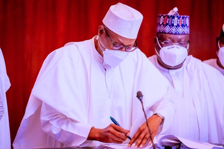 Buhari Signs Three Bills In Renewed Fight Against Money Laundering, Terrorism
