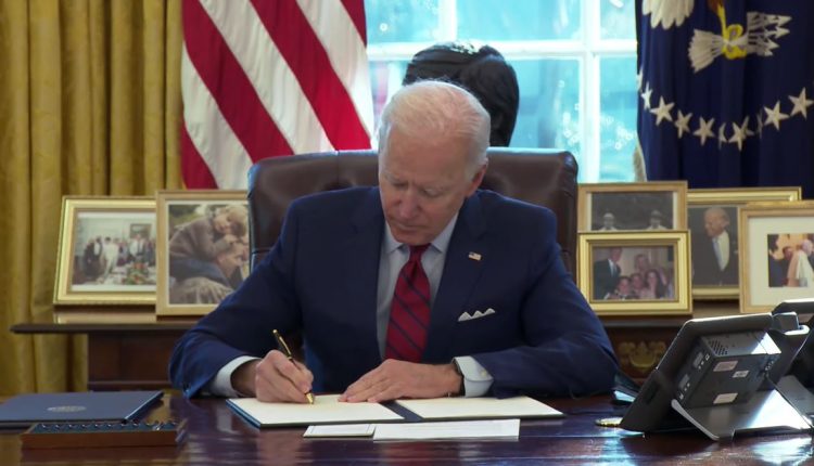 Joe-Biden-signing-an-executive-order-750x430