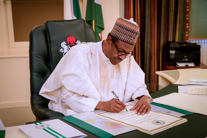 Buhari Signs 16 Constitution Amendment Bills Into Law